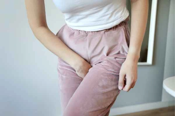 older woman running to the toilet because of urinary incontinence Feltham